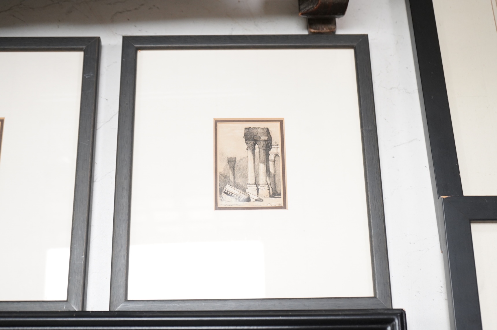 A set of four plaster plaques depicting classical scenes and four 18th/19th century architectural etchings, framed, largest 43cm high